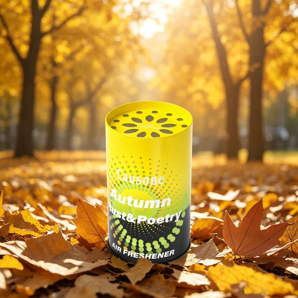 Causone Autumn Rust & Poetry solid air freshener can on autumn leaves