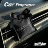 carsachet-egyptian-night-sachet-on-air-vent CARSACHET Egyptian Night car sachet with ribbon bow hanging on a car air vent