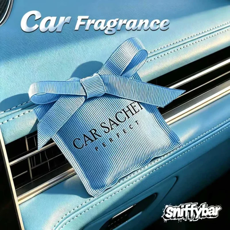 CARSACHET Sleeping Beauty blue car sachet with ribbon bow on a car air vent
