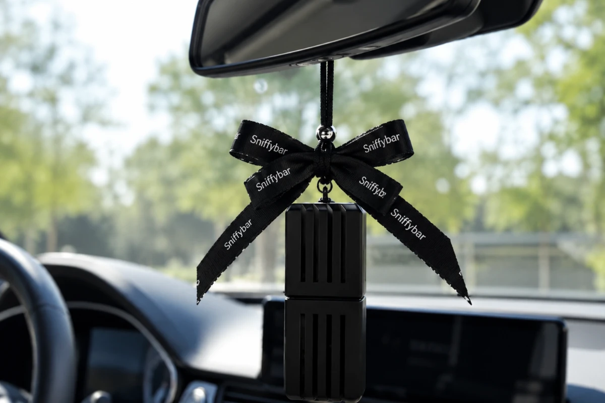 Essential oil car diffuser alternative — Sniffybar hanging freshener in a car